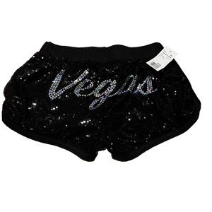 Black sequins “booty” shorts.  “Vegas” silver sequins print on rear end.